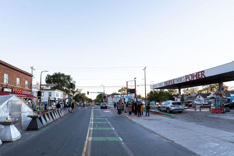 George Floyd Square, Minneapolis: Visitors and Protest Site 1 George Floyd Square, also known as the "Autonomous Zone," in Minneapolis, is pictured here. The intersection of Chicago Avenue and 38th Street became a focal point for protests following the murder of George Floyd by Minneapolis police on May 25, 2020. The area was occupied by protesters for an extended period, transforming it into a space for community gathering and remembrance. A prominent banner on a nearby gas station reads "WHERE THERE'S PEOPLE THERE'S POWER."