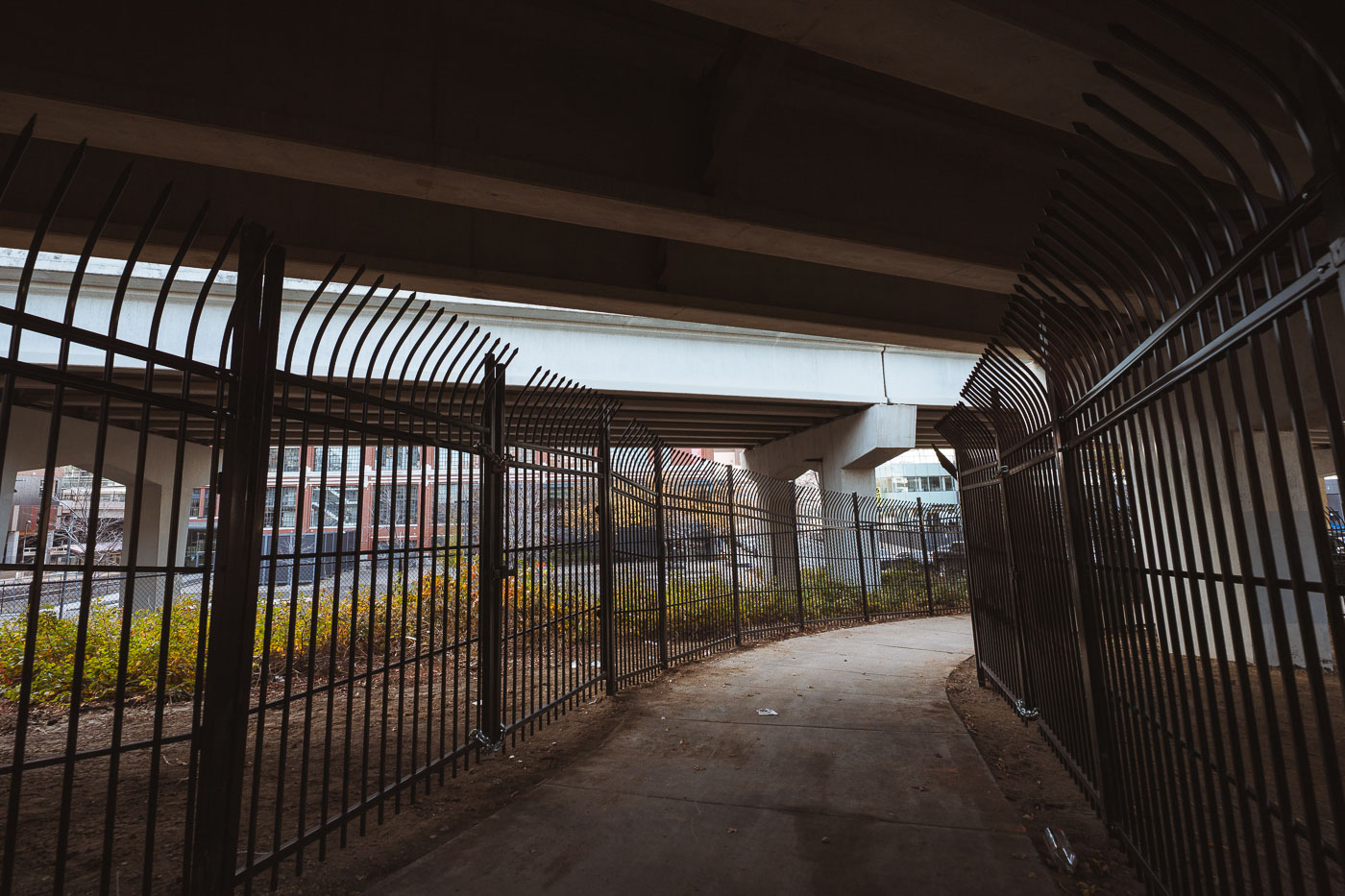 New fencing dropped in the North Loop on N 5th Ave and I-94. It's too bad, was a fun spot to watch trains.  Could see the Light Rail, Northstar Line and freight trains from under this bridge.