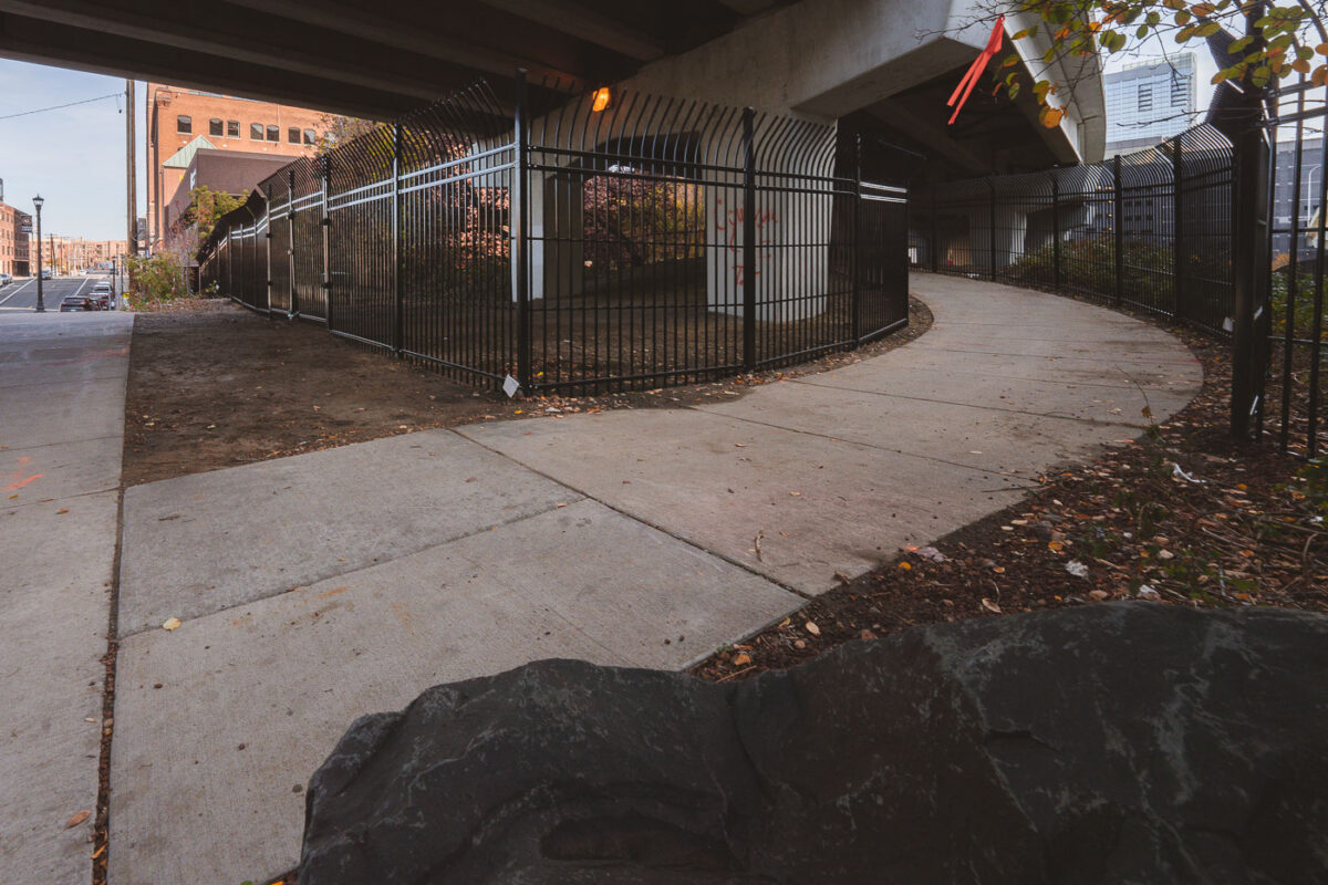 New fencing dropped in the North Loop on N 5th Ave and I-94. It's too bad, was a fun spot to watch trains.  Could see the Light Rail, Northstar Line and freight trains from under this bridge.
