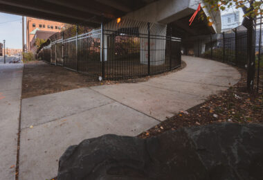 New fencing dropped in the North Loop on N 5th Ave and I-94. It's too bad, was a fun spot to watch trains.  Could see the Light Rail, Northstar Line and freight trains from under this bridge.