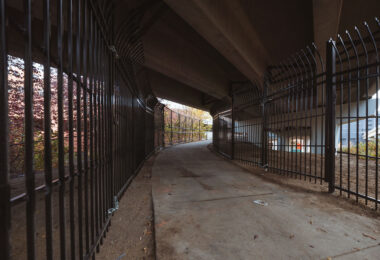 New fencing dropped in the North Loop on N 5th Ave and I-94. It's too bad, was a fun spot to watch trains.  Could see the Light Rail, Northstar Line and freight trains from under this bridge.