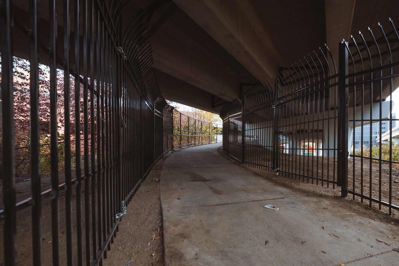 New fencing dropped in the North Loop on N 5th Ave and I-94. It's too bad, was a fun spot to watch trains.  Could see the Light Rail, Northstar Line and freight trains from under this bridge.