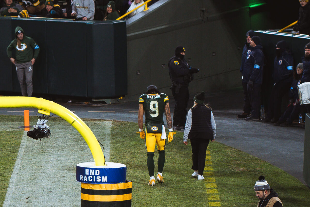 Christian Watson leaves the field