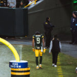 Green Bay Packers wide receiver Christian Watson leaves the field on December 23, 2024 in a game vs the New Orleans Saints.