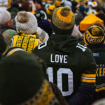 Fan wears a Jordan Love jersey at the Green Bay Packers vs New Orleans Saints at Lambeau Field on December 23, 2024