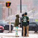 A man wears a Green Bay Packers Jordan Love jersey on Lombardi Avenue outside of Lambeau Field on December 23, 2024. The Green Bay Packers beat the New Orleans Saints 34-0.