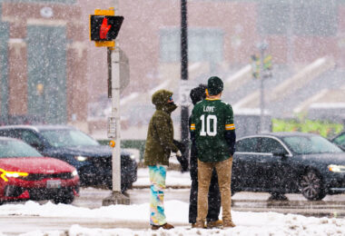 A man wears a Green Bay Packers Jordan Love jersey on Lombardi Avenue outside of Lambeau Field on December 23, 2024. The Green Bay Packers beat the New Orleans Saints 34-0.