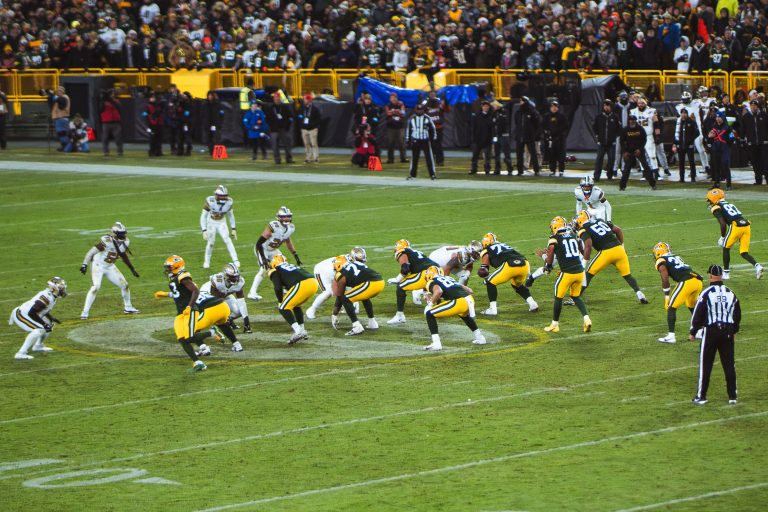 Jordan Love Runs the Offense, Lambeau Field 2 Green Bay Packers quarterback Jordan Love leads an offensive play against the New Orleans Saints at Lambeau Field.