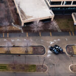 Newly erected fencing and Minnetonka Police security cameras outside the corporate headquarters of UnitedHealthcare in Minnetonka, Minnesota on December 8, 2024. The insurance company’s CEO Brian Thompson was killed on December 4th, 2024 in New York City. The man who was shown on a security camera shooting Thompson has not yet been identified or arrested.
