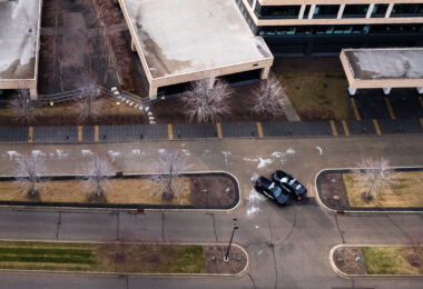 Newly erected fencing and Minnetonka Police security cameras outside the corporate headquarters of UnitedHealthcare in Minnetonka, Minnesota on December 8, 2024. The insurance company’s CEO Brian Thompson was killed on December 4th, 2024 in New York City. The man who was shown on a security camera shooting Thompson has not yet been identified or arrested.