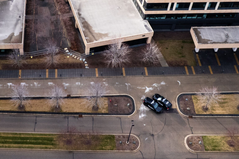 Minnetonka Police at UnitedHealthcare HQ 4 Newly erected fencing and Minnetonka Police security cameras outside the corporate headquarters of UnitedHealthcare in Minnetonka, Minnesota on December 8, 2024. The insurance company’s CEO Brian Thompson was killed on December 4th, 2024 in New York City. The man who was shown on a security camera shooting Thompson has not yet been identified or arrested.