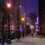 A jogger in the snow on Washington Avenue in the North Loop near Bunkers Bar & Grill.