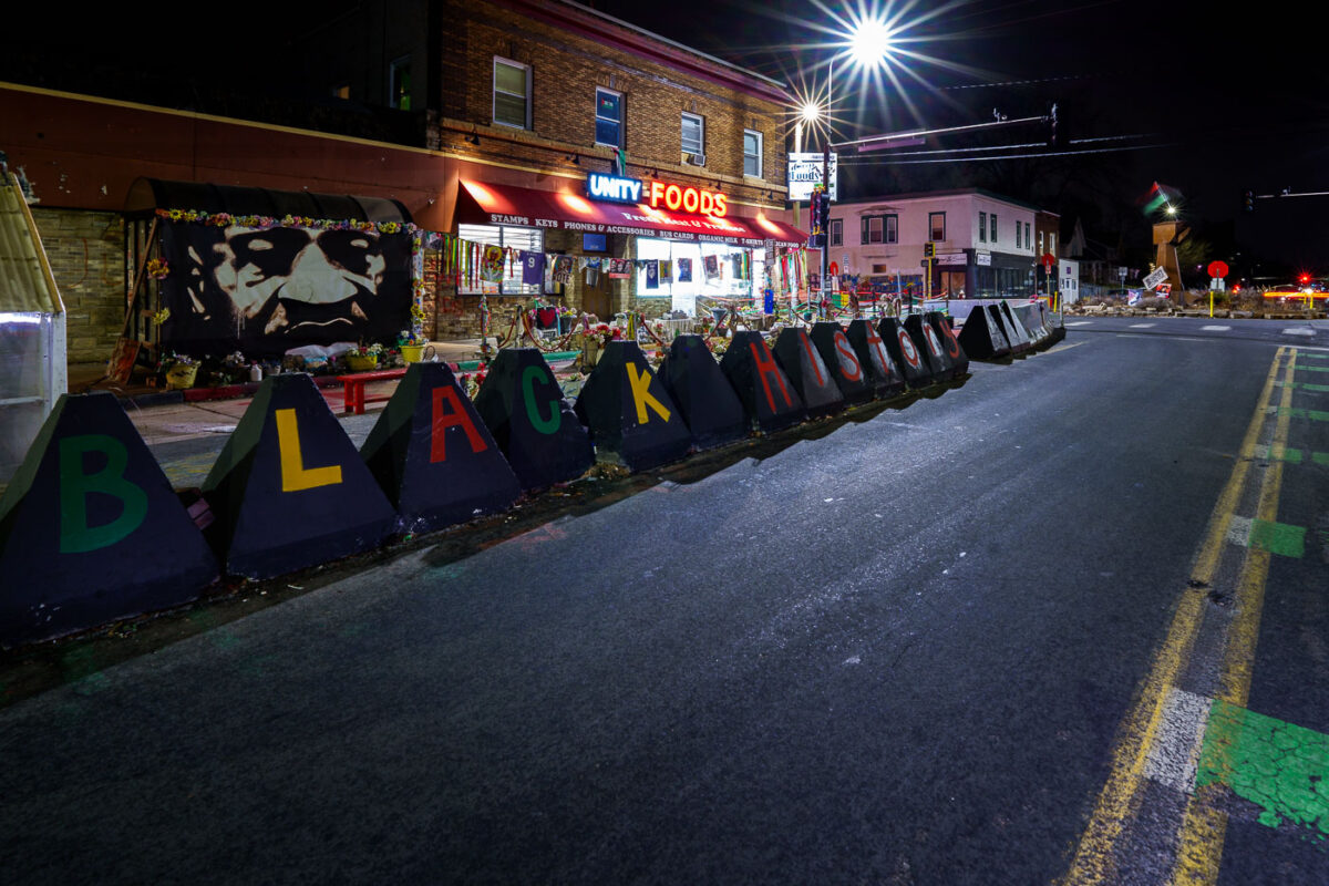 Black History written on the barricades around the George Floyd Memorial inside George Floyd Square in South Minneapolis. The intersection has been a place of protest since the 2020 murder of George Floyd.