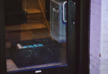 A box of eggs placed in a doorway on Lake Street in Minneapolis.