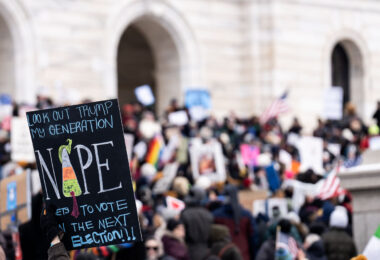 Protester at the Minnesota State Capitol on February 5, 2025. Those gathered were protesting the Trump administration and Elon Musk
