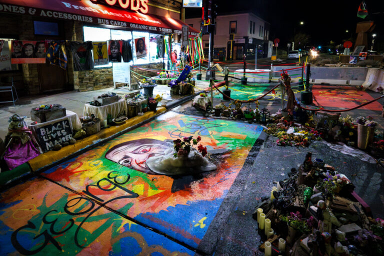George Floyd Square Winter February 2025 2 Ice in a shape of a heart on the spot where George Floyd was murdered by Minneapolis Police in May 2020.The memorial inside George Floyd Square has been a place of protest ever since.