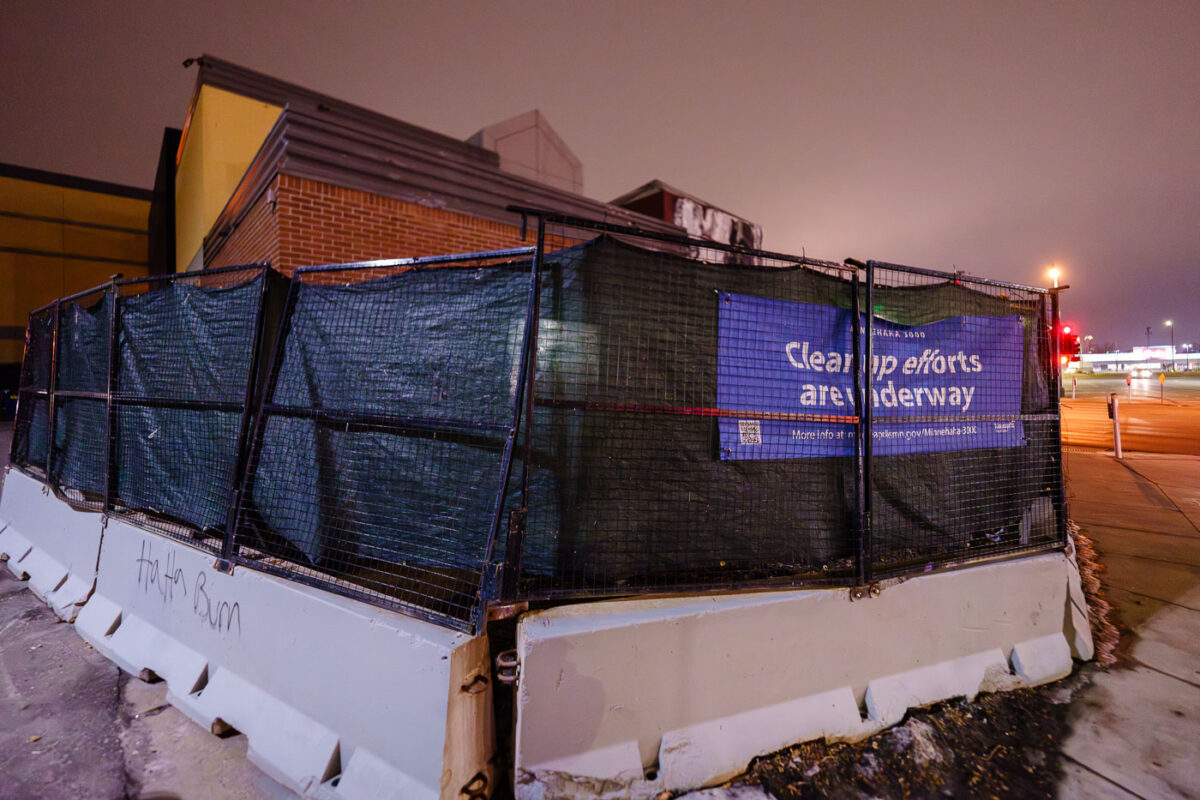 Signage around the 3rd precinct Minneapolis police station that was burned following the 2020 murder of George Floyd.