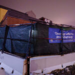 Signage around the 3rd precinct Minneapolis police station that was burned following the 2020 murder of George Floyd.
