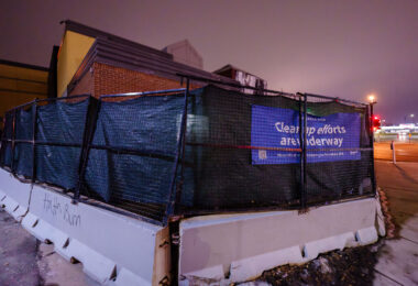 Signage around the 3rd precinct Minneapolis police station that was burned following the 2020 murder of George Floyd.