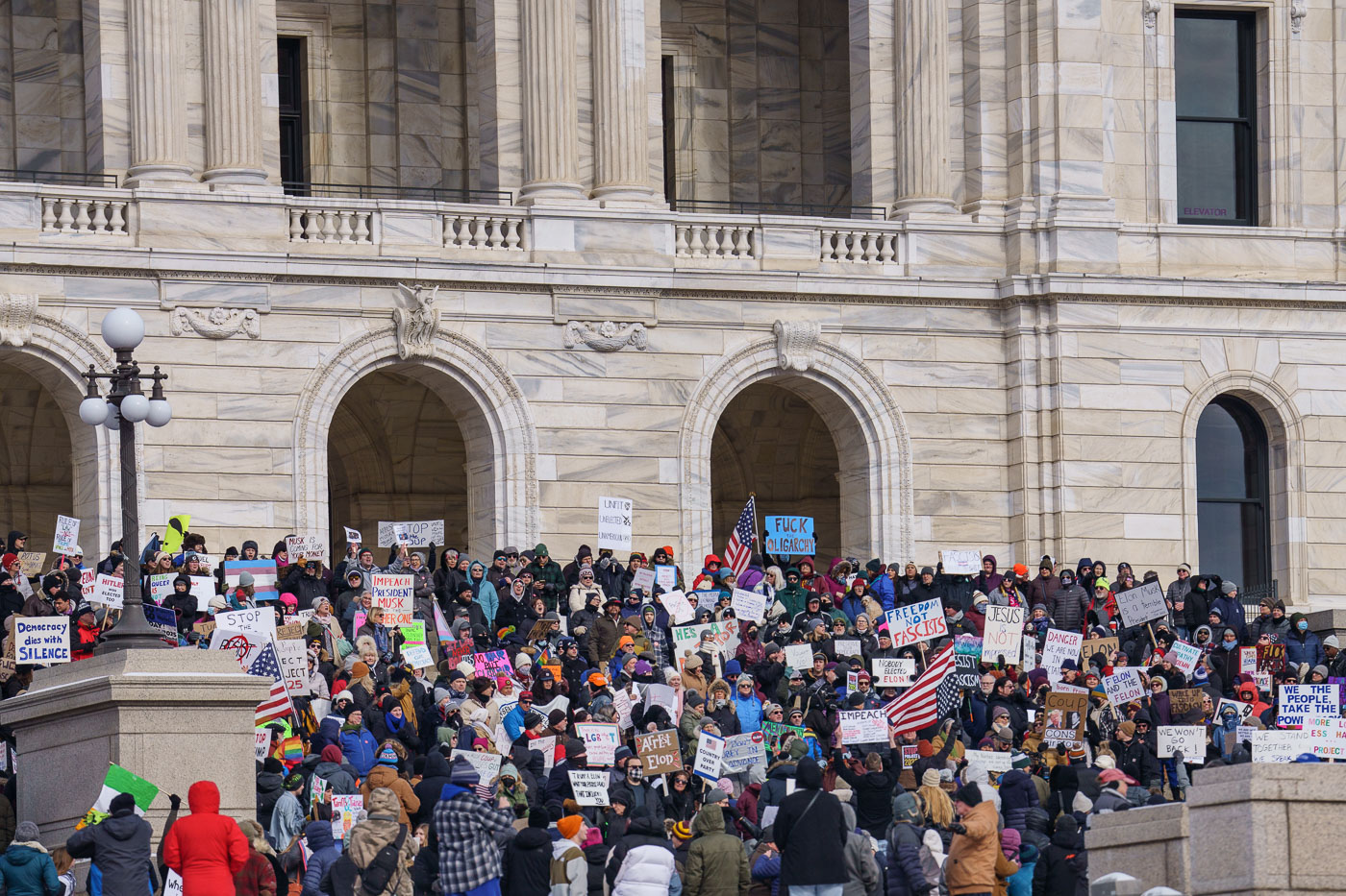 Protesters gathered at the Minnesota State Capitol on February 5, 2025 to protest actions taken by President Trump and Elon Musk. The protest was part of a nationwide protest said to be held in all 50 states.