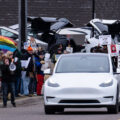 Arrest Musk Stop The Coup protest signs in Golden Valley