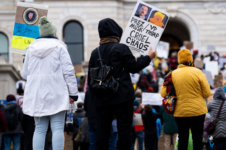 50501 Protest in MN: Cruel Chaos Protest Sign 4 Protesters at the Minnesota State Capitol in St. Paul, Minnesota on March 4, 2025. Taking place on the afternoon of President Trump’s first address to joint session in congress, they are protesting the actions of the Trump Administration and Elon Musk’s involvement.
The protest was organized as part of the “50501” protests taking place around the country. This is the first of two planned protests this week. Another is planned for Saturday at the State Capitol.