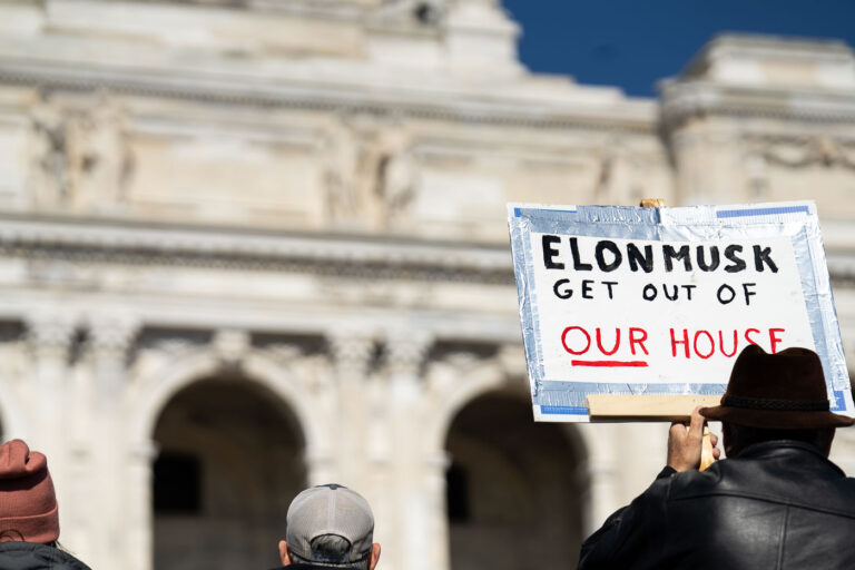 Elon Musk Get Out Of Our House Protest Sign 1 Today on International Women’s Day, Minnesota saw the largest protest since President Trump's re-election. 1,000+ gathered at the Capitol for the 2nd time this week hearing from activists, city council members and state representatives on the current administration's actions.
Minnesota State Capitol
March 8, 2025