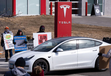 Tesla Takedown protest at a Tesla showroom in Minneapolis (Golden Valley) on March 22, 2025. This is the 6th week in a row protesters have gathered. The crowd has continued to grow exponentially each week.