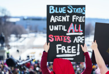 Today on International Women’s Day, Minnesota saw the largest protest since President Trump's re-election. 1,000+ gathered at the Capitol for the 2nd time this week hearing from activists, city council members and state representatives on the current administration's actions.

Minnesota State Capitol
March 8, 2025