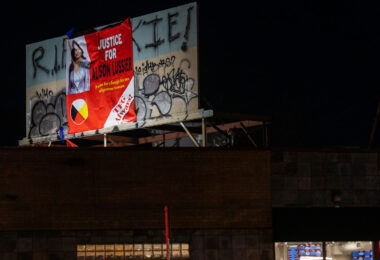 A justice for Allison Lussier billboard on Lake Street in Minneapolis.