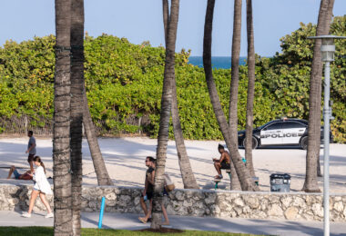 Miami Beach Police drive up and down park land during 2025 Spring Break.