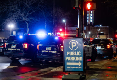Squad cars at a nightclub in Uptown Minneapolis in March 2025.