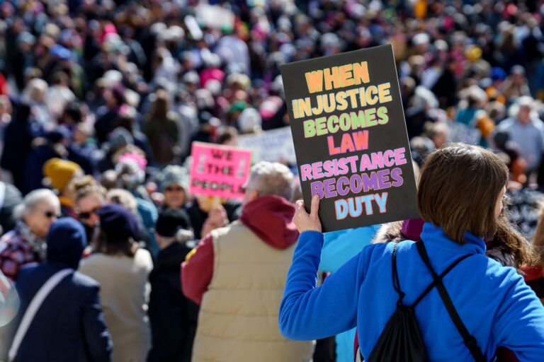 Protest sign in Minnesota March 8 2025 1 "When Justice Becomes Law Resistance Becomes Duty" protest sign in St. Paul.Today on International Women’s Day, Minnesota saw the largest protest since President Trump's re-election. 1,000+ gathered at the Capitol for the 2nd time this week hearing from activists, city council members and state representatives on the current administration's actions.Minnesota State CapitolMarch 8, 2025