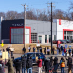Protesters outside of a Tesla facility in Golden Valley, Minnesota on March 1st, 2025. This is the third weekend in a row they've gathered to protest the actions of Elon Musk and the current administration.