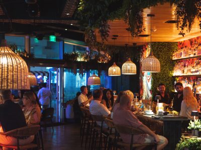 Woven Pendant Lights Above a South Beach Bar Crowd