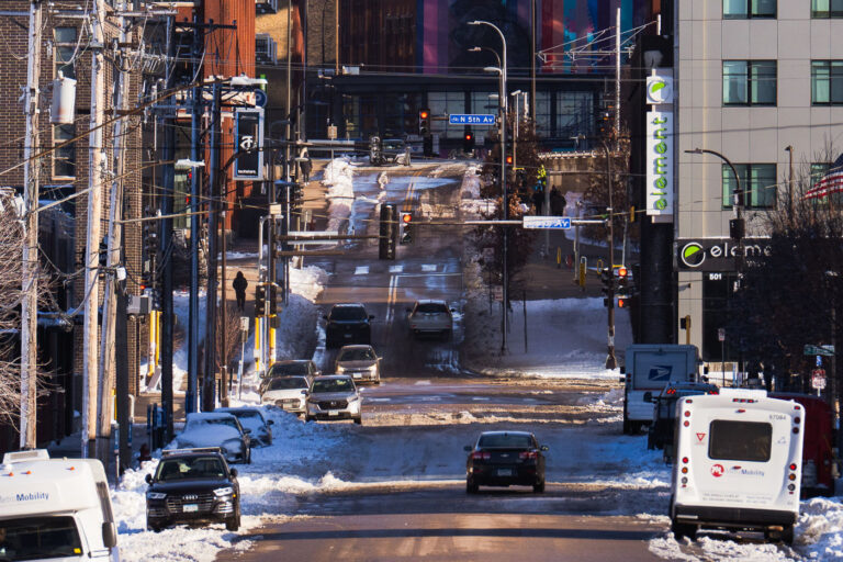 Looking down North 5th Street in Minneapolis 2 Spring snow and North 5th Street in Downtown Minneapolis.