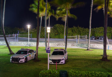 Squad cars parked near the beach in South Beach during 2025 Spring Break.