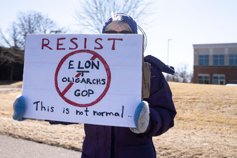 Tesla Protests - Resist Elon Tesla Oligarchs GOP 2 Protester holding up a sign that reads "Resist Elon Tesla Oligarchs GOP This is not normal" outside a Tesla facility in just outside of Minneapolis (Golden Valley) on March 1st, 2025.
This is the third weekend in a row they've gathered to protest the actions of Elon Musk and the current administration