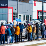 Tesla Cybertruck drives to a Tesla Facility just outside of Minneapolis (Golden Valley) on March 8, 2025.This is the 4th week in a row protesters have gathered here as part of the nationwide Tesla Takedown organizing.