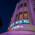 The Tony Hotel lit up signs at night in Miami Beach Florida