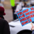 Trump protest sign in Minneapolis 2025
