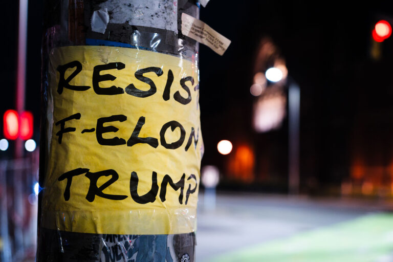 Resist F-Elon Trump at Harvard University 1 Taped to a pole at Harvard University, "Resist F-Elon Trump at Harvard University".