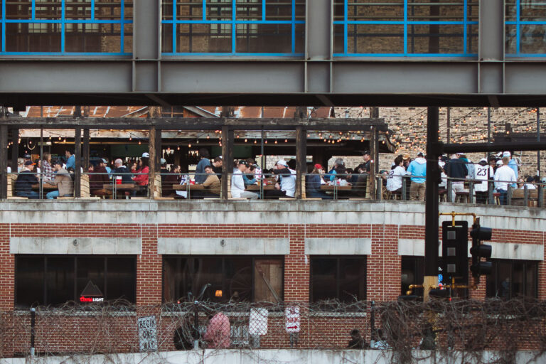 Cowboy Jack's Rooftop Patio April 2025 1 A full rooftop patio at Cowboy Jack's in downtown Minneapolis on a warm spring day.