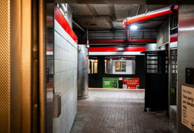 Getting off an elevator at Andrew Station on the red line in Boston.