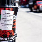 A layered set of flyers taped to a pole near Harvard Square reveals the intense atmosphere surrounding debates on the Israel–Gaza conflict. The underlying poster promotes a “Global Day of Action for Gaza,” while a separate sheet on top adds a sharply critical response, contrasting the slogans of various groups with mocking commentary. This kind of street pole collage — layered, confrontational, and public — captures the friction between activism and counter-activism common around Harvard Square’s sidewalks, where local and global politics often meet in view of passing students and commuters.