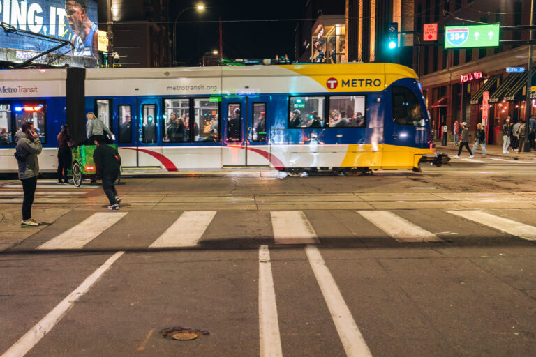 Light rail train in Minneapolis on warm spring night 3 A light rail train moves towards the Warehouse District/Hennepin Ave station on a warm spring evening.