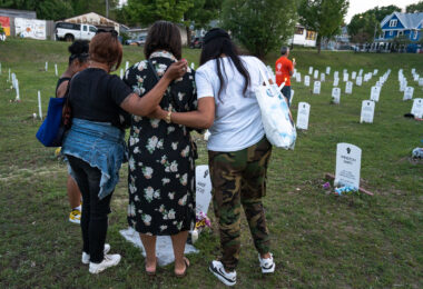 The family of Amir Locke at the Amir Locke marker in Say Their Names Cemetery on the 5th anniversary of George Floyd's murder.