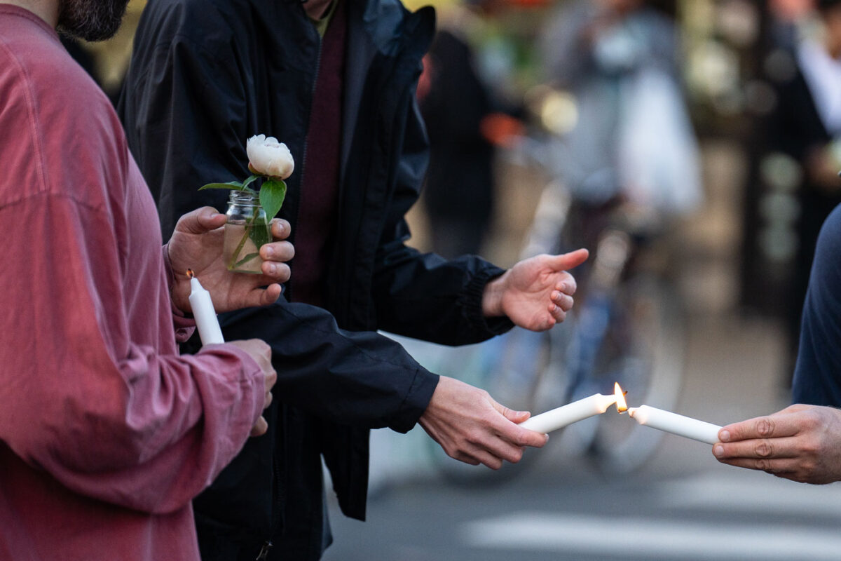 Candles being lit prior to a vigil on the 5th anniversary of the murder of George Floyd.