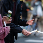 Candles being lit at Rise and Remember 2 Candles being lit prior to a vigil on the 5th anniversary of the murder of George Floyd.