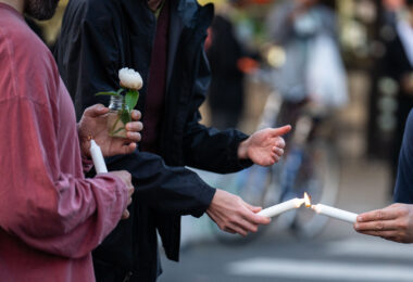 Candles being lit prior to a vigil on the 5th anniversary of the murder of George Floyd.